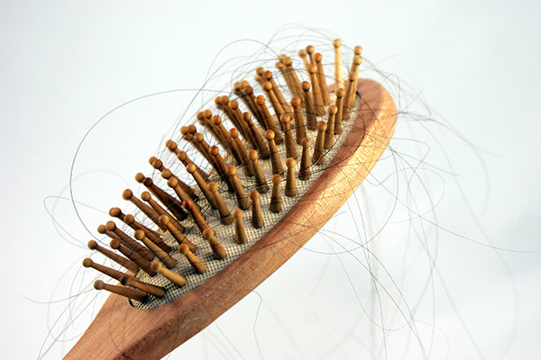 how much hair fall is normal in summer?