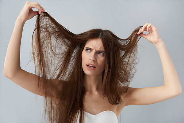 What Are the Causes and Home Remedies for Frizzy Hair?